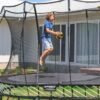 Which Surfaces Work Best for Backyard Trampolines?